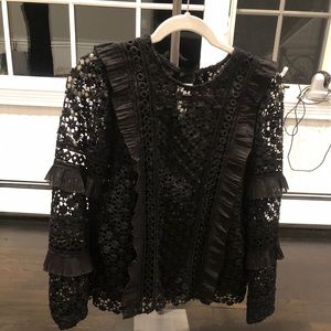 Aqua ruffled laced black top.  Women small.